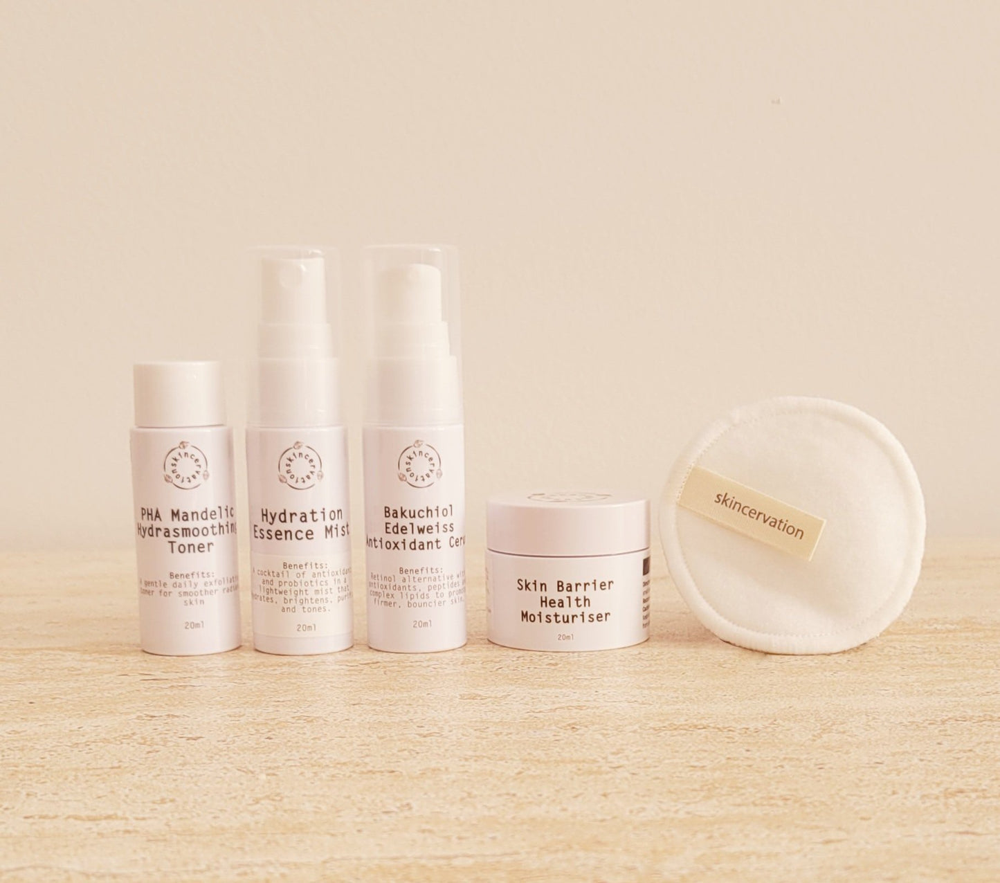 Skincervation Base Skincare Travel Set with toner, essence mist, antioxidant cream, moisturiser, and reusable cotton pad