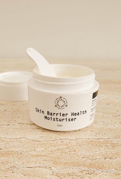 Moisturiser with Ceramide for Skin Barrier Health with Open Lid and Spoon