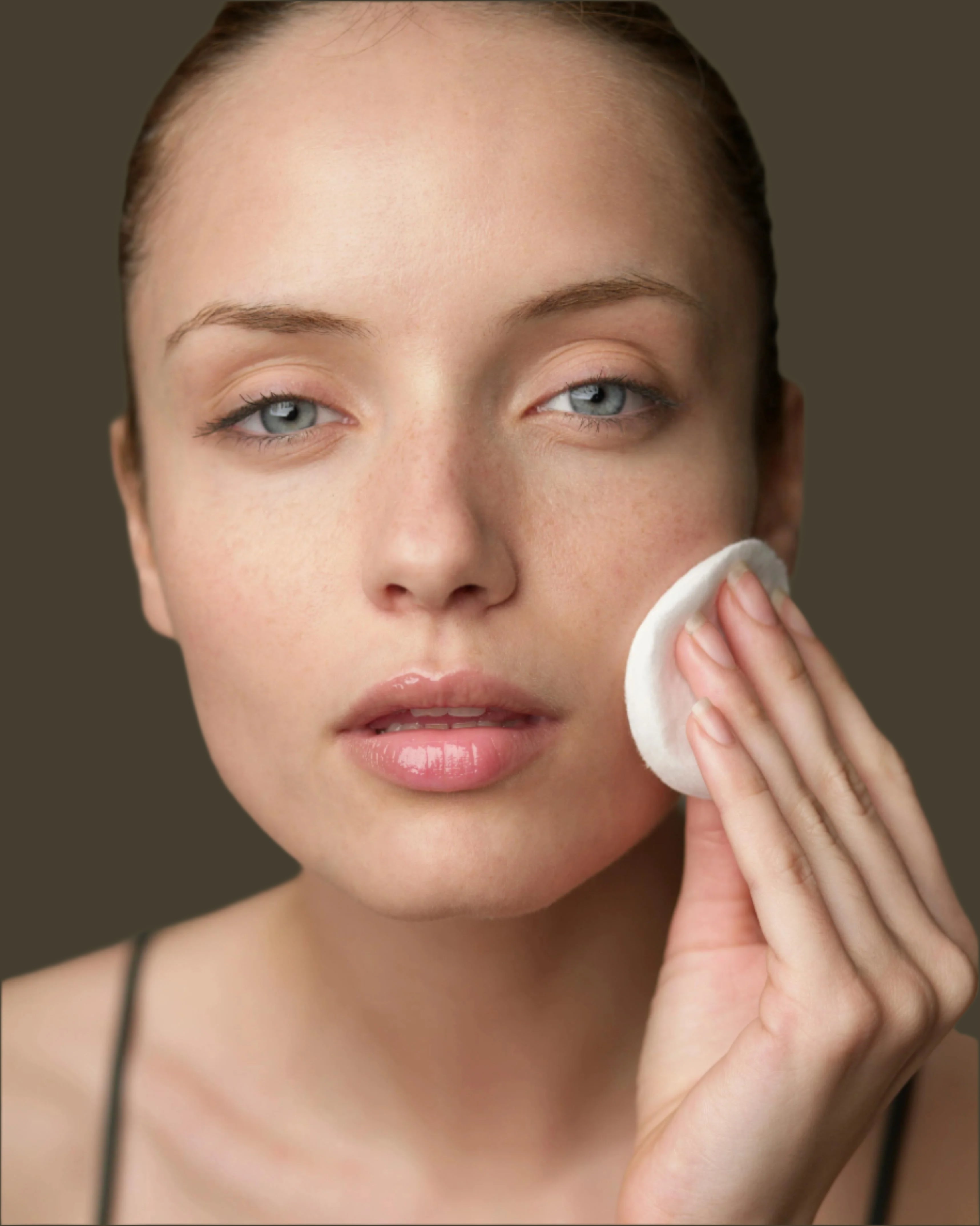 Woman with good skin using Facial Pad