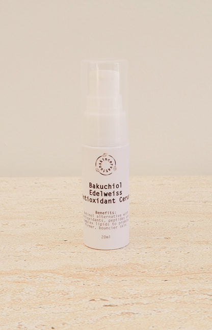 Skincervation Bakuchiol Edelweiss Antioxidant Cerum Serum in white pump bottle on beige surface