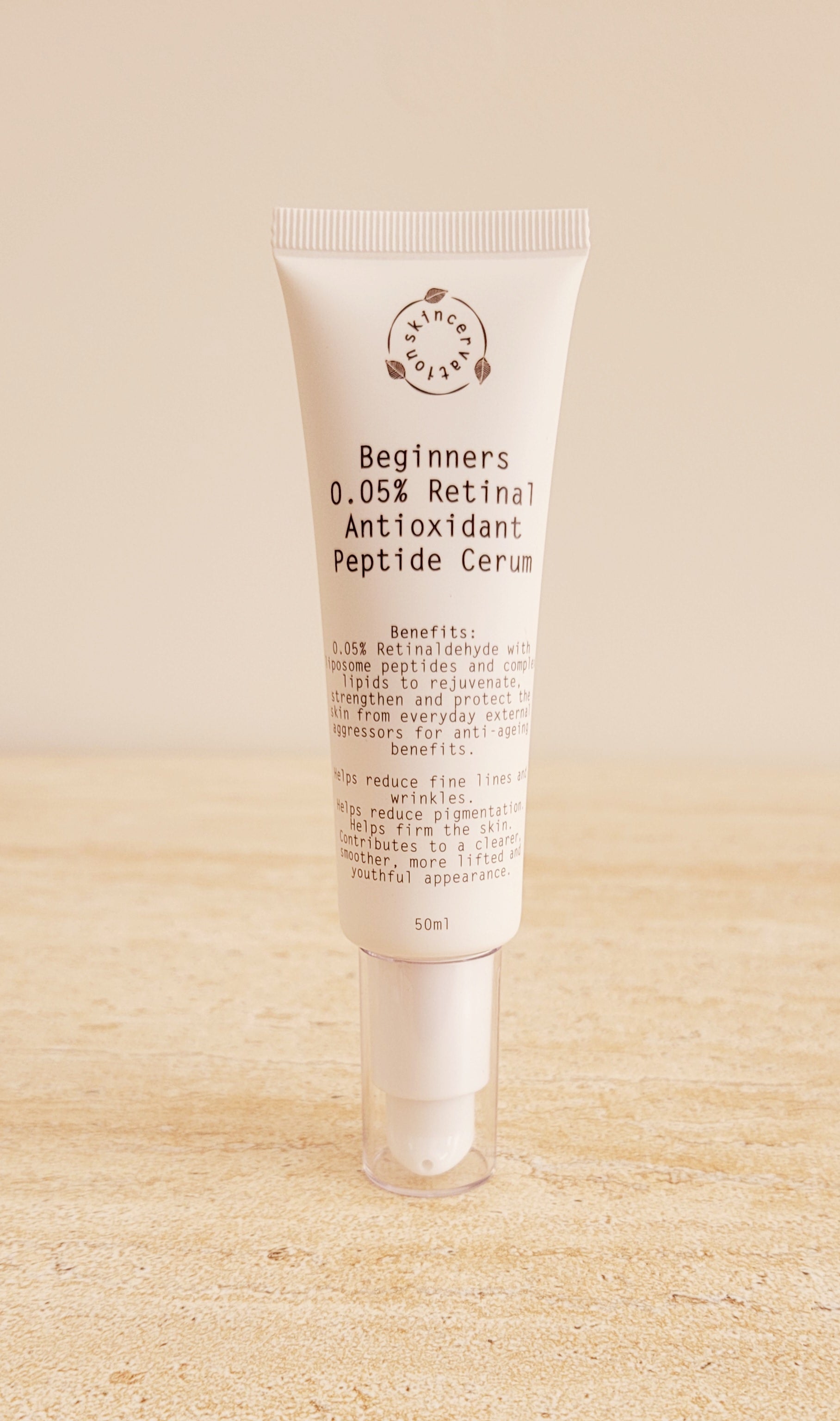 Beginners Retinal Antioxidant Peptide serum tube by skincervation on beige surface for skincare