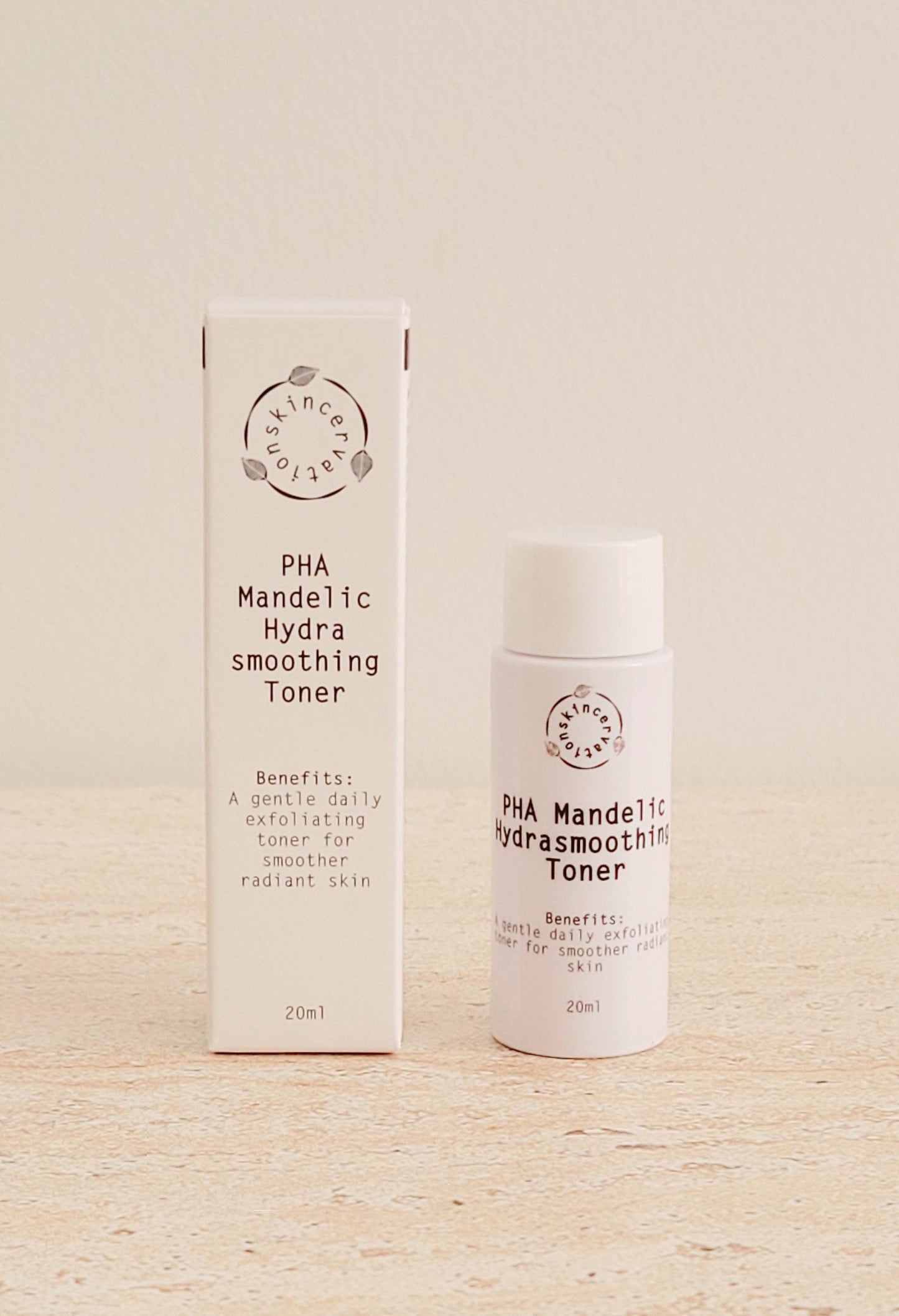 A 20ml Bottle of exfoliating toner standing next to its box