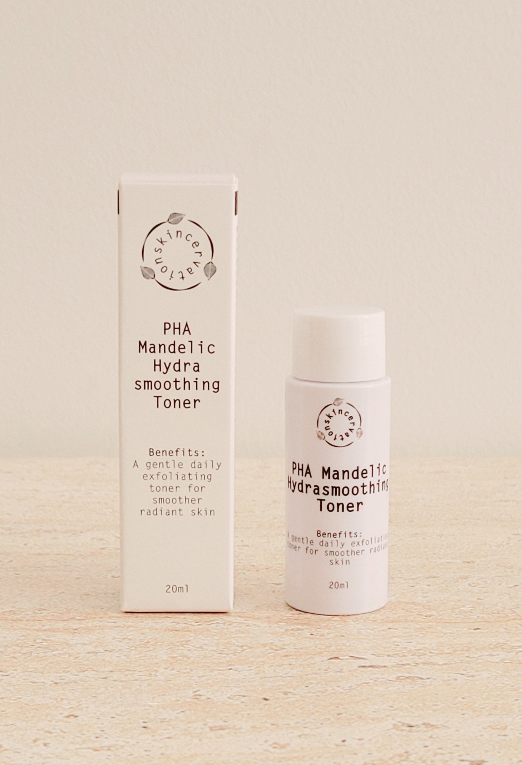 A 20ml Bottle of exfoliating toner standing next to its box