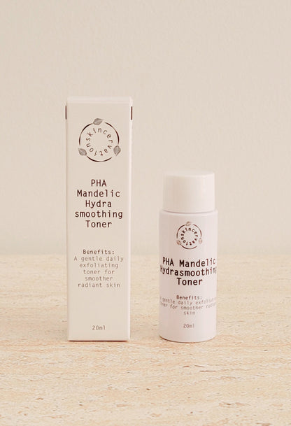 A 20ml Bottle of exfoliating toner standing next to its box