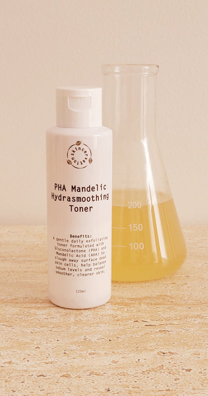 A Bottle of pHA Mandelic Hydrating Toner standing next scientific beaker with yellow liquid